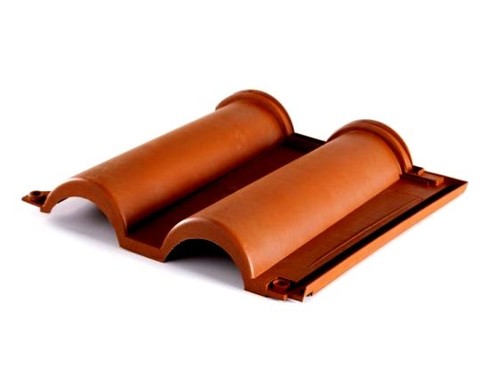 Tegola plastica con - in,